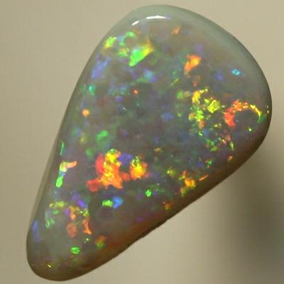 SOLID SEMI BLACK OPAL Sparkles of red, orange, green and blue